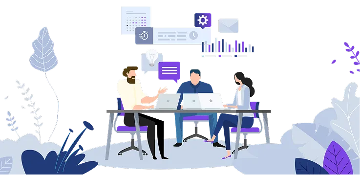 Three professionals collaborating around a table with laptops, planning a business strategy