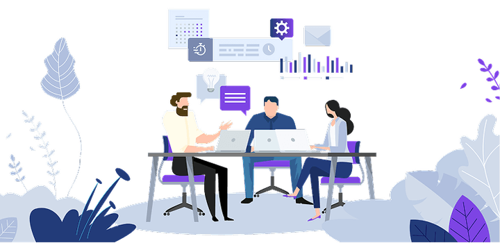 Three professionals collaborating around a table with laptops, planning a business strategy